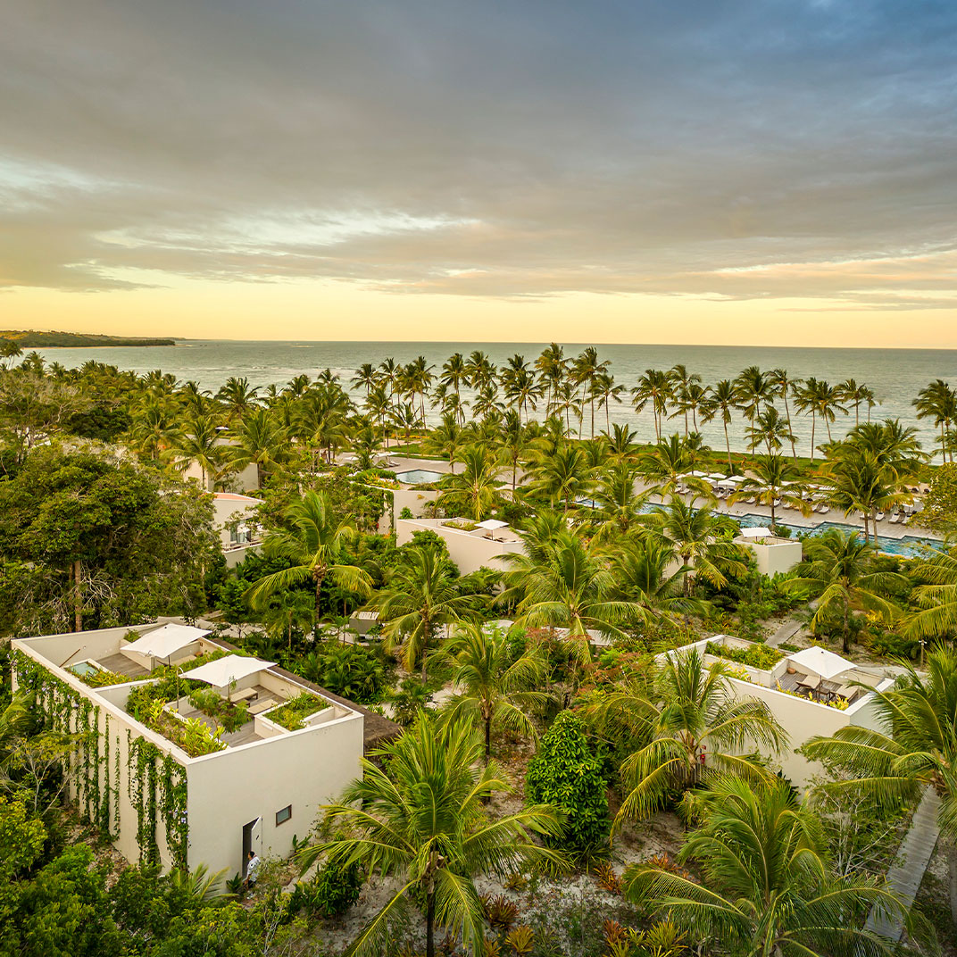 Aerial view of a luxury beachfront villa complex on the Bahia coast